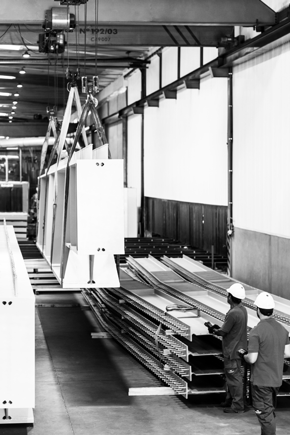 Blocotelha workers supervising production in the factory.